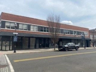 Rahway apartment for rent - a truck is parked in front of a building