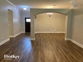 Middleburg house for rent - an empty living room with a hard wood floor