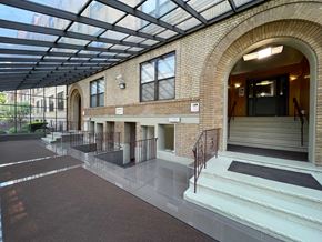 East Orange apartment for rent - A building with a glass roof and brick walls.