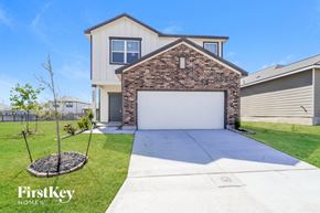 Saint Hedwig house for rent - a white garage door in front of a house