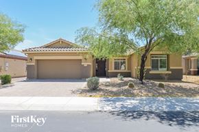 Marana house for rent - A house with a tree in front of it.