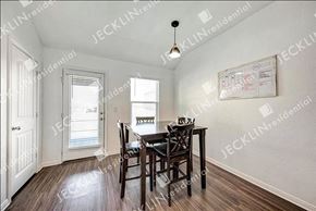 Georgetown house for rent - an empty dining room with a table and chairs