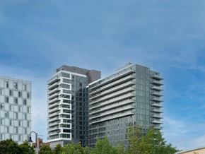 Oshawa apartment for rent - two tall buildings with a blue sky in the background