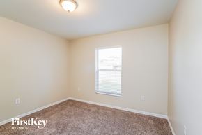Lehigh Acres house for rent - a spacious room with carpet and a window