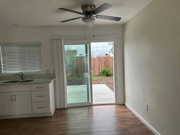 Whittier apartment for rent - A kitchen with a sink, cabinets, and a ceiling fan.