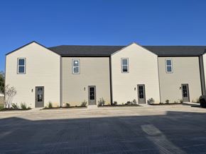 Youngsville apartment for rent - a large building with a street in front of it