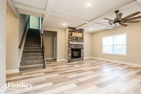 Clarksville house for rent - the living room has a fireplace and a staircase to the second floor