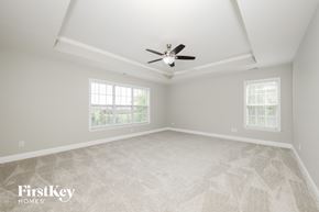 Advance house for rent - the master bedroom has a vaulted ceiling and a ceiling fan