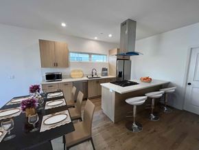 North Hollywood apartment for rent - a kitchen and dining area with a table and chairs