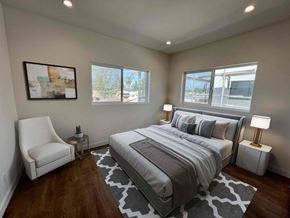 North Hollywood apartment for rent - a bedroom with a bed and a chair