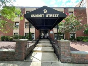 East Orange apartment for rent - The Summit Street sign is black and white.