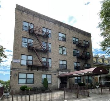 East Orange apartment for rent - A building with the sign "La Ferral Properties" on the front.
