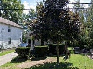 Warren house for rent - A white house with a tree in front of it.