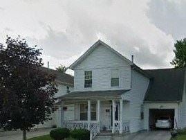 Warren house for rent - A white house with a porch and a car in the driveway.