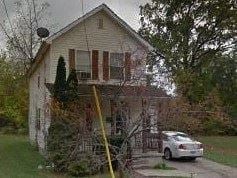 Warren house for rent - A white car is parked in front of a house.