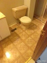St Louis house for rent - a bathroom with a toilet and a tile floor