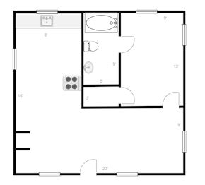 Gainesville house for rent - A black and white image of a bathroom with a toilet, sink, and mirror.