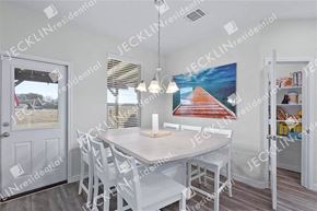 Hutto house for rent - A dining room with a white table and chairs.