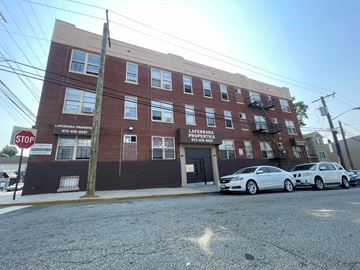 Irvington apartment for rent - A red brick building with a sign that says Lafferty Properties.