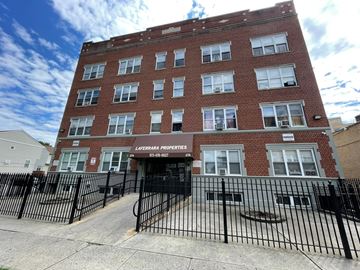 East Orange apartment for rent - A red brick building with the words "Lafferty Properties" on the front.