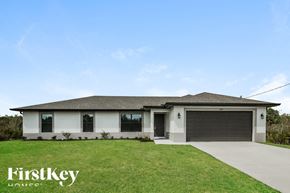 Lehigh Acres house for rent - a brand new house with a garage door