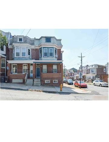 Wilmington apartment for rent - A red car is parked on the street.