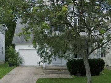 Warren house for rent - a white house with a tree in front of it