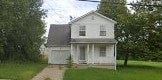 Warren house for rent - A white house with a grey roof and a porch.