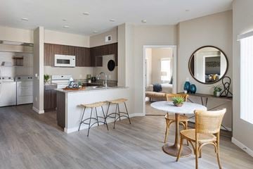 Avondale apartment for rent - a kitchen and living room with a table and chairs