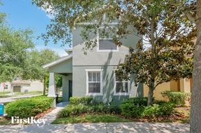 Riverview house for rent - A house with a tree in front of it.