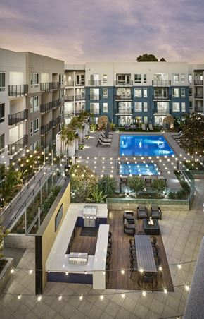 Lomita apartment for rent - Aerial view of Kaia South Bay featuring apartment buildings and resort-style pool