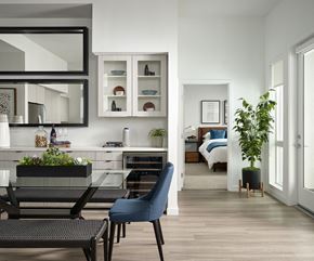 Lomita apartment for rent - Living and dining area in B934 two-bedroom apartment at Kaia South Bay, featuring a table with chairs and open layout