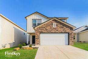 Saint Hedwig house for rent - a house with a garage door in front of it