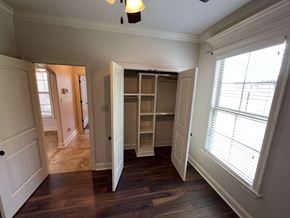 Lafayette house for rent - a bedroom with a closet and a large window