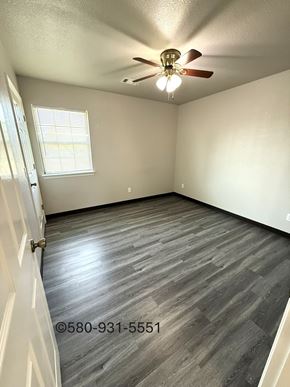 Durant apartment for rent - A room with a ceiling fan and a window.