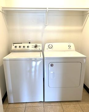 Durant apartment for rent - a kitchen with a washer and dryer next to each other