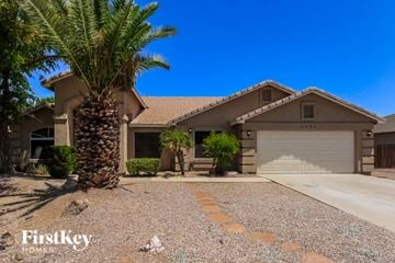 San Tan Valley house for rent - a house with a palm tree in front of it