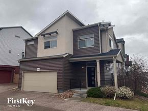 Castle Rock house for rent - a brown and with a garage door