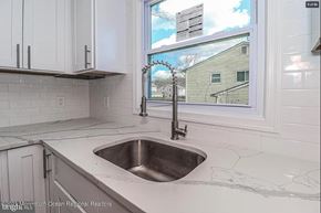 Cherry Hill house for rent - A kitchen with a sink and a window.