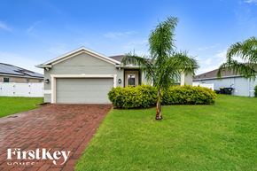 Orange City house for rent - a home with a palm tree in the front yard