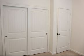 Merced house for rent - Three white doors in a row.