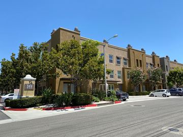 Fullerton apartment for rent - A street view of a building with a sign that says "Sunrise".