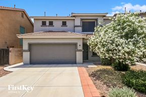 San Tan Valley house for rent - A modern house with a garage and a driveway.