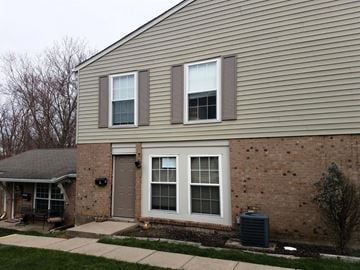 Fairfield house for rent - a brick house with a white door and windows