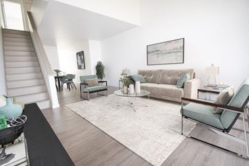 New Haven apartment for rent - a living room with a couch and chairs and a rug