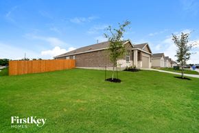 San Antonio house for rent - a home with a yard and a wooden fence