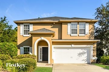 Fernandina Beach house for rent - a yellow house with a white garage door