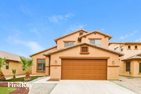 Buckeye house for rent - a house with a garage door in front of it