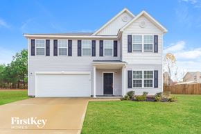 Covington house for rent - A two-story house with a garage is for sale by FirstKey Homes.