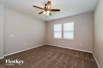 St Augustine house for rent - the spacious living room with carpet and ceiling fan